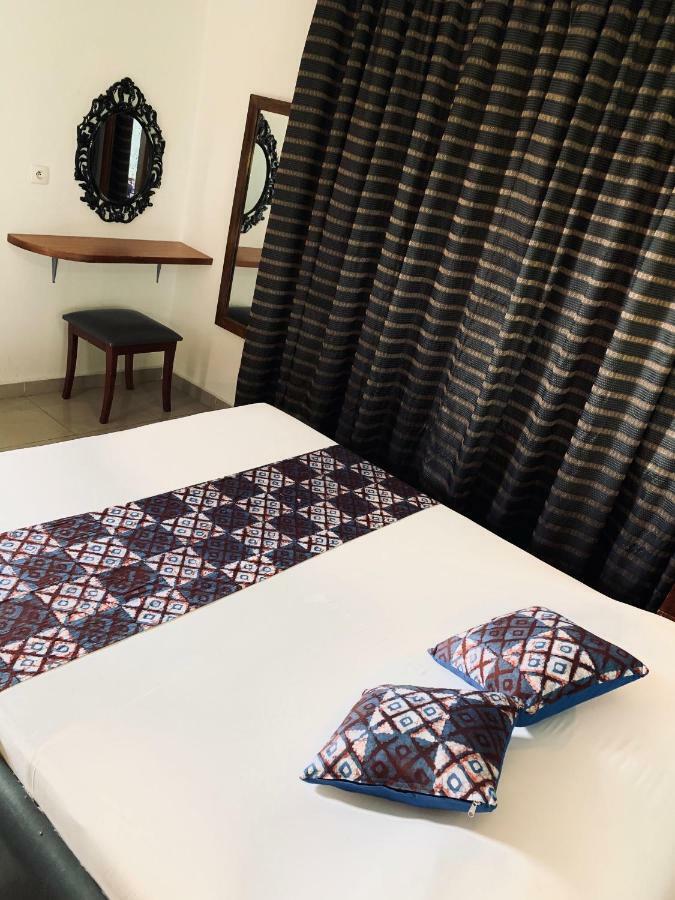 Residence Bertille Abidjan Cocody Экстерьер фото